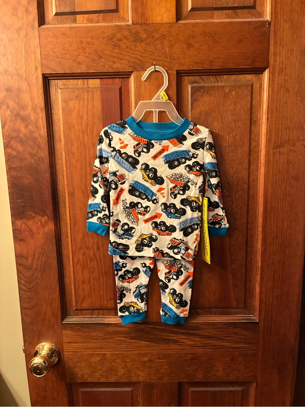 Kidgets, 2 piece NEW WITH TAGS, infant boy’s pajamas. Size 12 months.